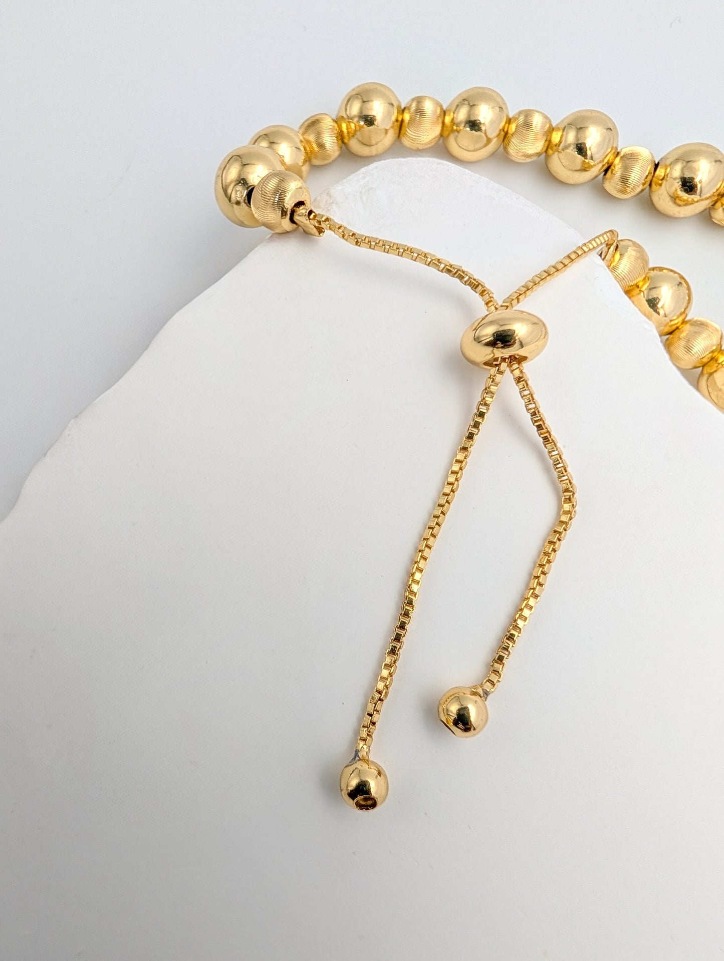 PULSERA DORADA D6